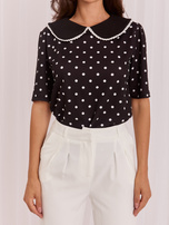 Black women's blouse with a decorative collar.