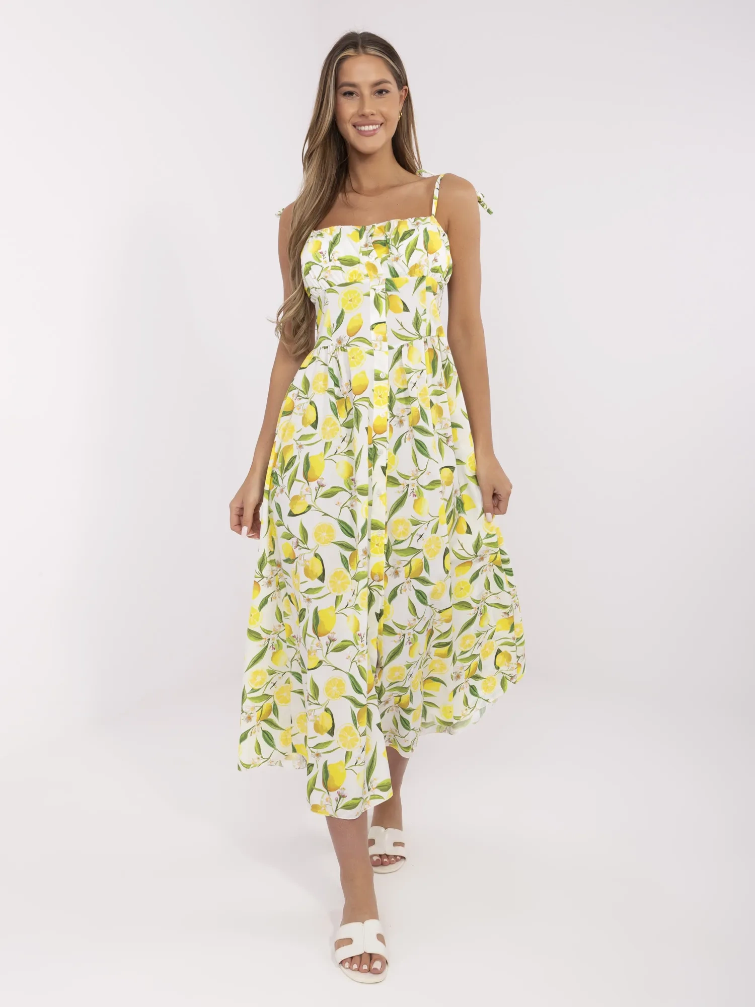 Ecru-yellow long dress with lemons.
