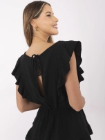 Black muslin jumpsuit with ruffles.