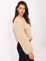 Beżowa przejściowa kurtka typu balloon