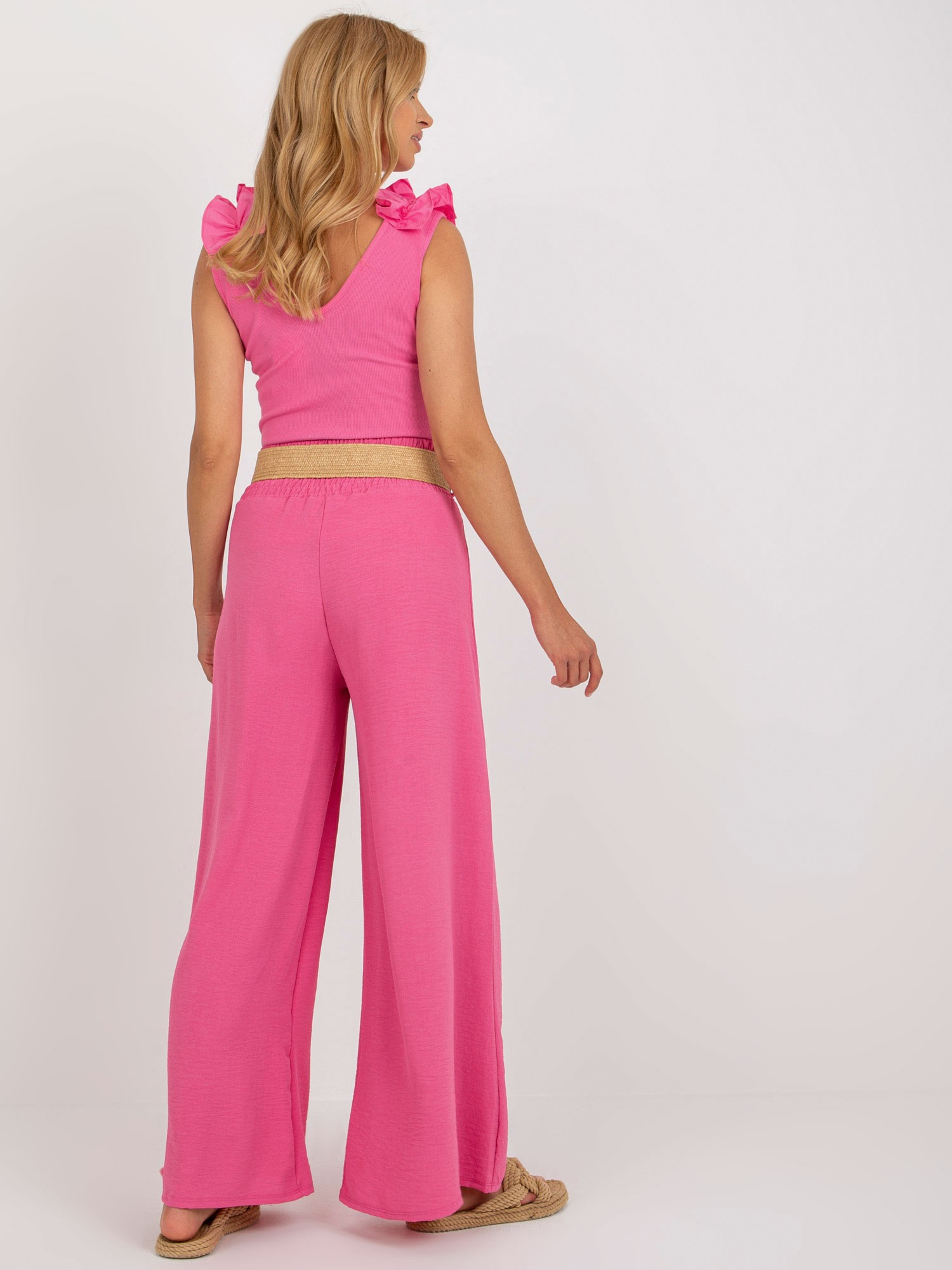 Różowe spodnie z materiału palazzo high waist