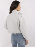 Szara kurtka wiatrówka ze ściągaczami na dole 