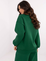 Hurtownia Ciemnozielona bluza bez kaptura z naszywkami