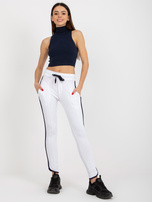 Hurt Białe dresowe spodnie basic z rozcięciem RUE PARIS