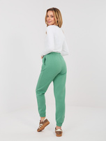 Pistacjowe ocieplane spodnie basic z kieszeniami