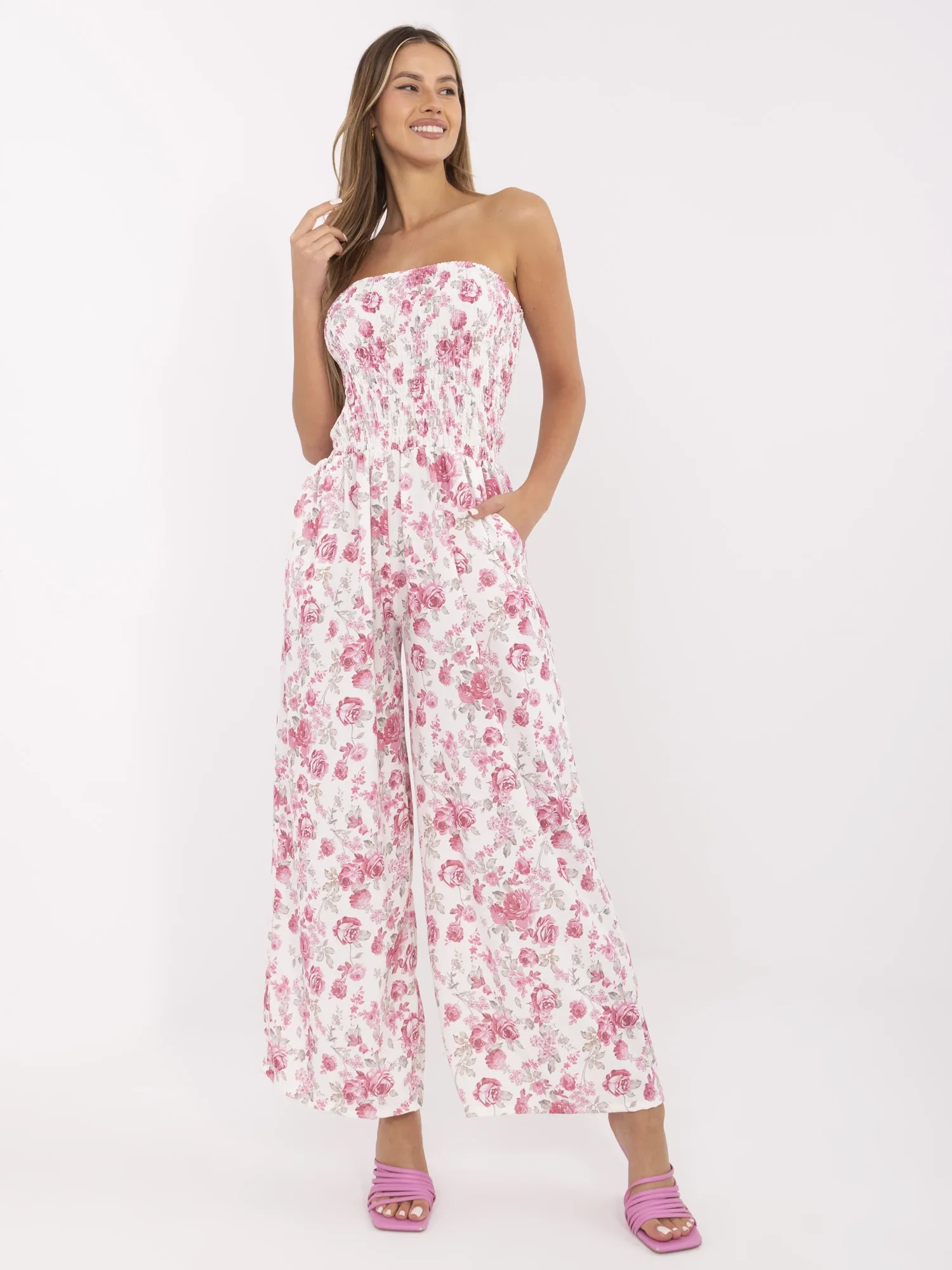 Ecru-pink long jumpsuit with flowers.
