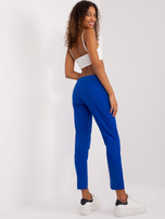 Hurtownia Kobaltowe spodnie dresowe z aplikacjami