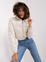 Hurt Light beige short puffer jacket with quilting.