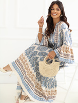 Blue oversized summer dress with patterns.