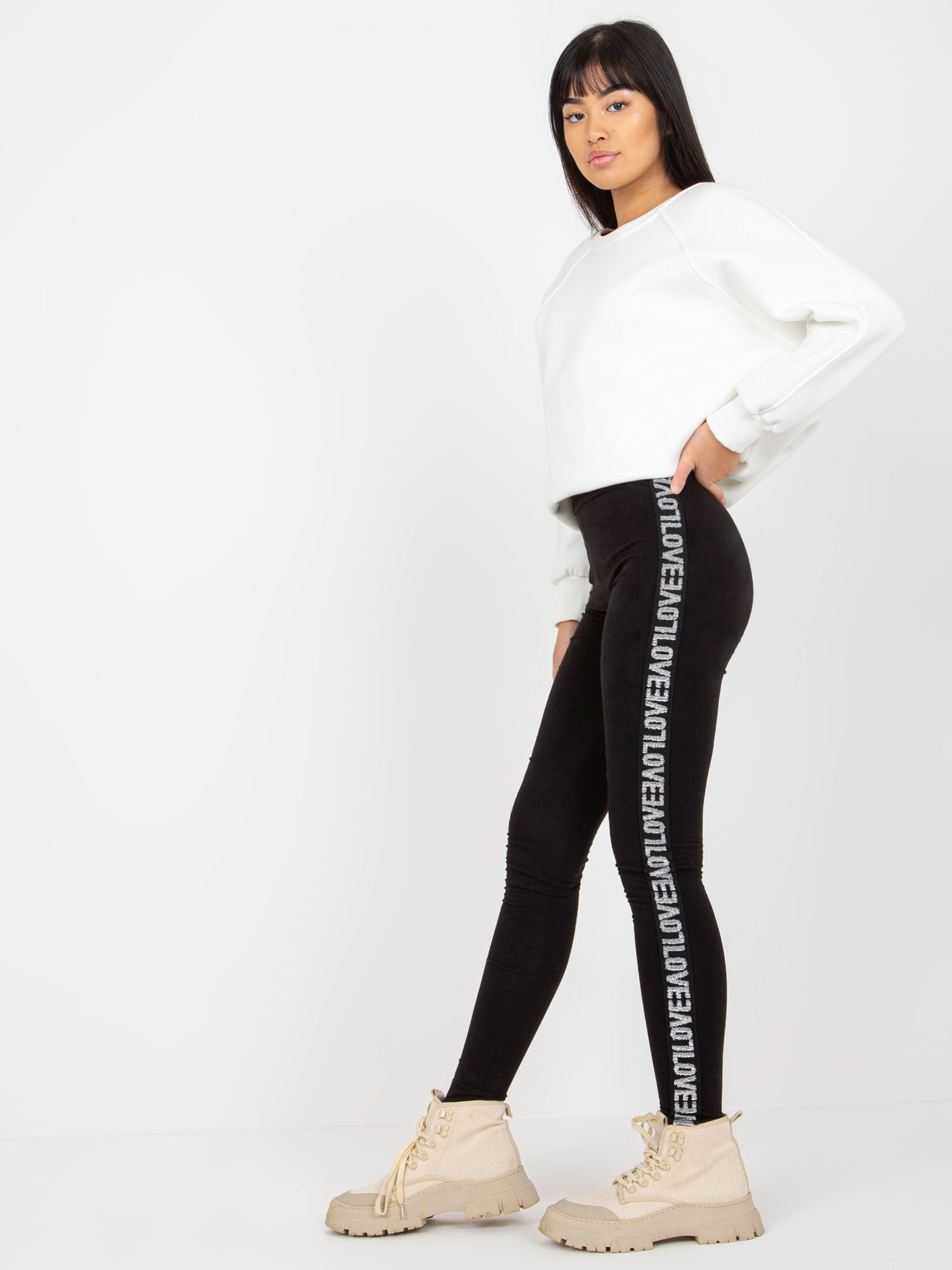 Czarne damskie legginsy casualowe z lampasami