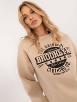 Hurtownia Beżowa damska bluza oversize z printem