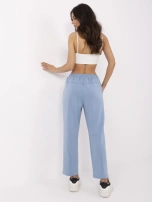 Blue trousers made of pleasant-to-touch material.
