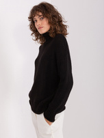 Großhandel Schwarzer Pullover mit Rollkragen im Oversize-Schnitt.