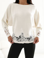 Ecru batwing sweater with mesh inserts.