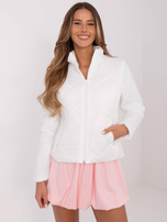 Hurt Biała pikowana kurtka damska z kieszeniami