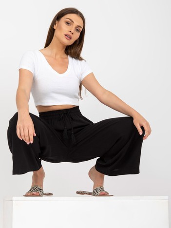 Czarne szerokie spodnie z materiału z kieszeniami SUBLEVEL