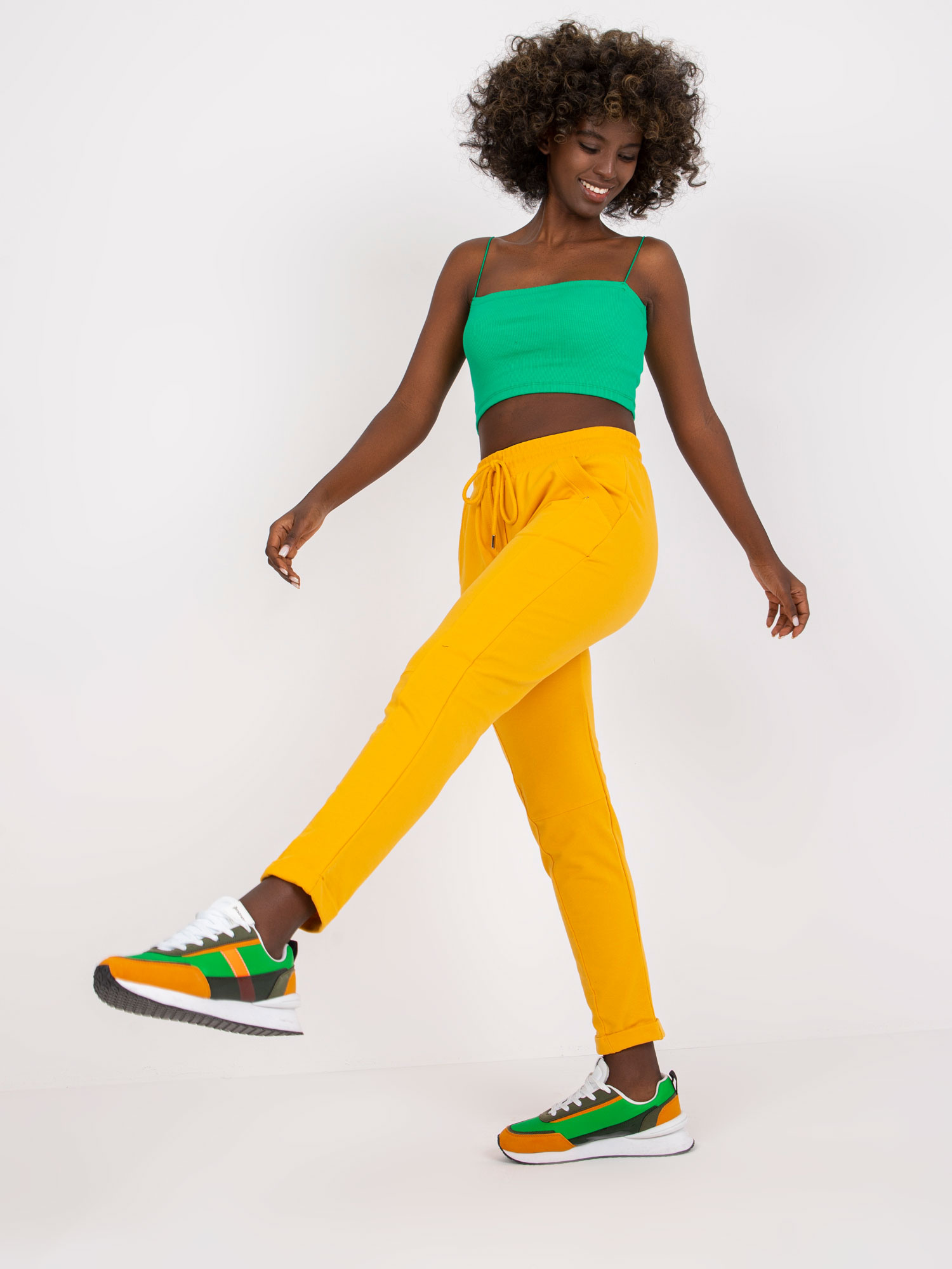 Bright orange basic sweatpants with pockets.
