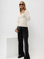 Hellebeige elegante Wickeljacke.