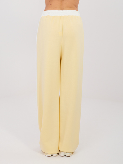 Jasnożółte dresowe spodnie wide leg RUE PARIS