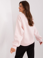 Hurtownia Jasnoróżowa bluza bez kaptura z napisem