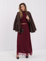 Burgundy maxi skirt with decorative finish.