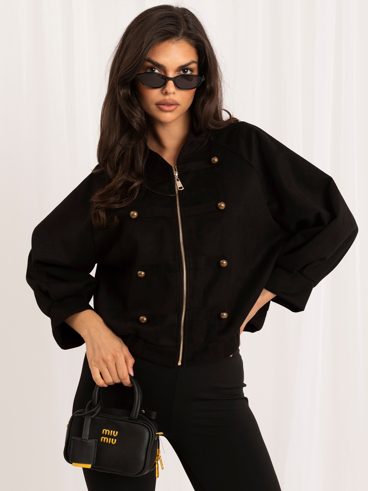 Black women's Napoleon-style jacket.