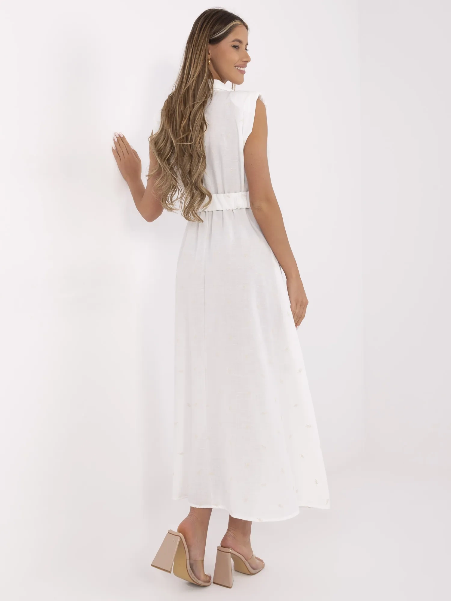 White flared dress with embroidery.
