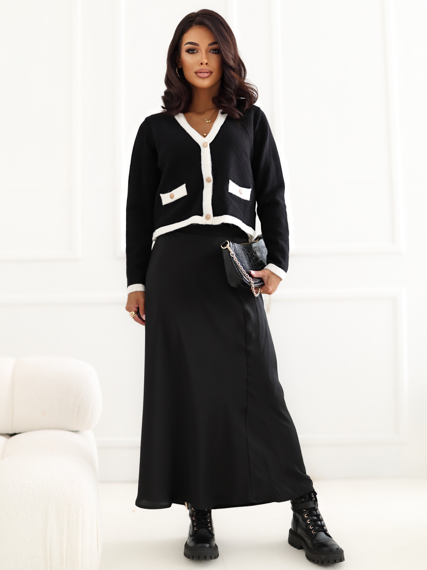 Black elegant 2-in-1 sweater with a vest.