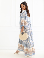 Blue oversized summer dress with patterns.