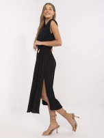 Black summer dress with shoulder pads.