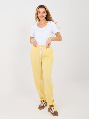 Jasnożółte dresowe spodnie z kieszeniami
