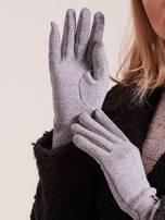 Graue elegante Handschuhe.
