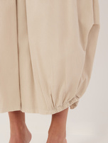 Beżowe sztruksowe spodnie z zakładkami