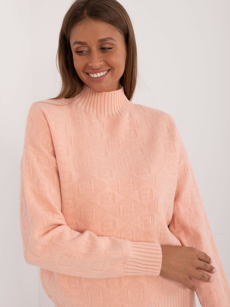 Hurt Brzoskwiniowy wzorzysty sweter z półgolfem