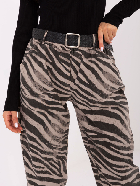 Beżowe damskie spodnie w zebrę