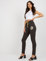 Hurt women's khaki sweatpants with stitching.