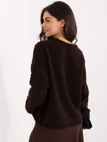 Dark brown oversized boucle sweater.
