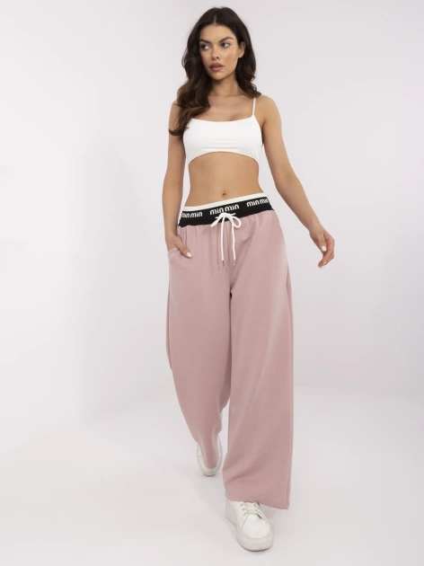 Brudnoróżowe dresowe spodnie z ozdobną gumą