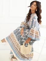 Blue oversized summer dress with patterns.