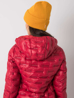 Dunkelgelbe Damen Beanie-Mütze.