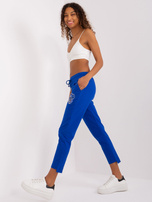 Hurtownia Kobaltowe spodnie dresowe z aplikacjami