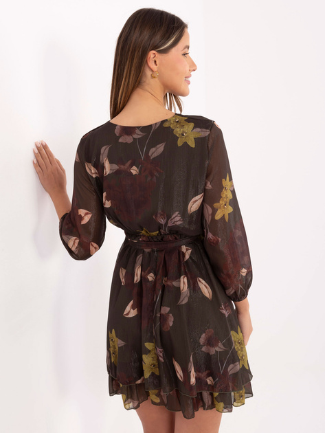 Ciemnozielona rozkloszowana sukienka z falbaną