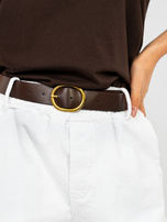 Białe sztruksowe spodnie z kieszeniami