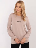 Hurtownia Beżowa luźna bluzka longsleeve z napisem