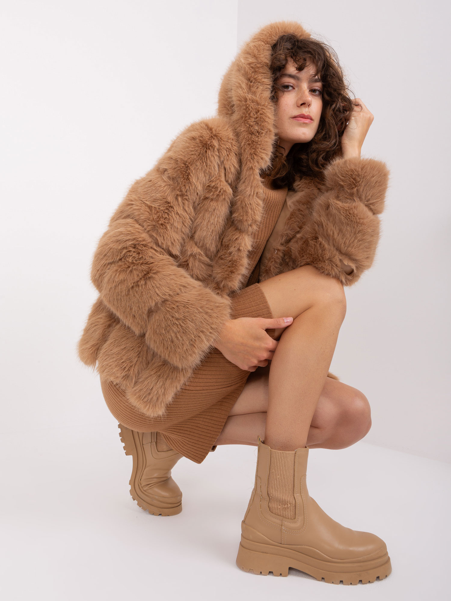 Hurt camel fur transitional jacket with hood.
