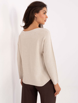 Light beige sweater with long sleeves.