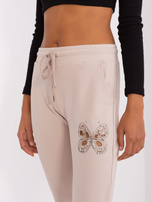 Hurt Jasnobeżowe spodnie dresowe z wycięciami 