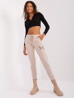 Hurt Jasnobeżowe spodnie dresowe z wycięciami 