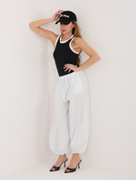 Białe spadochronowe spodnie bez zapięcia RUE PARIS 