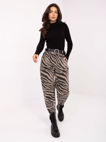 Beżowe damskie spodnie w zebrę